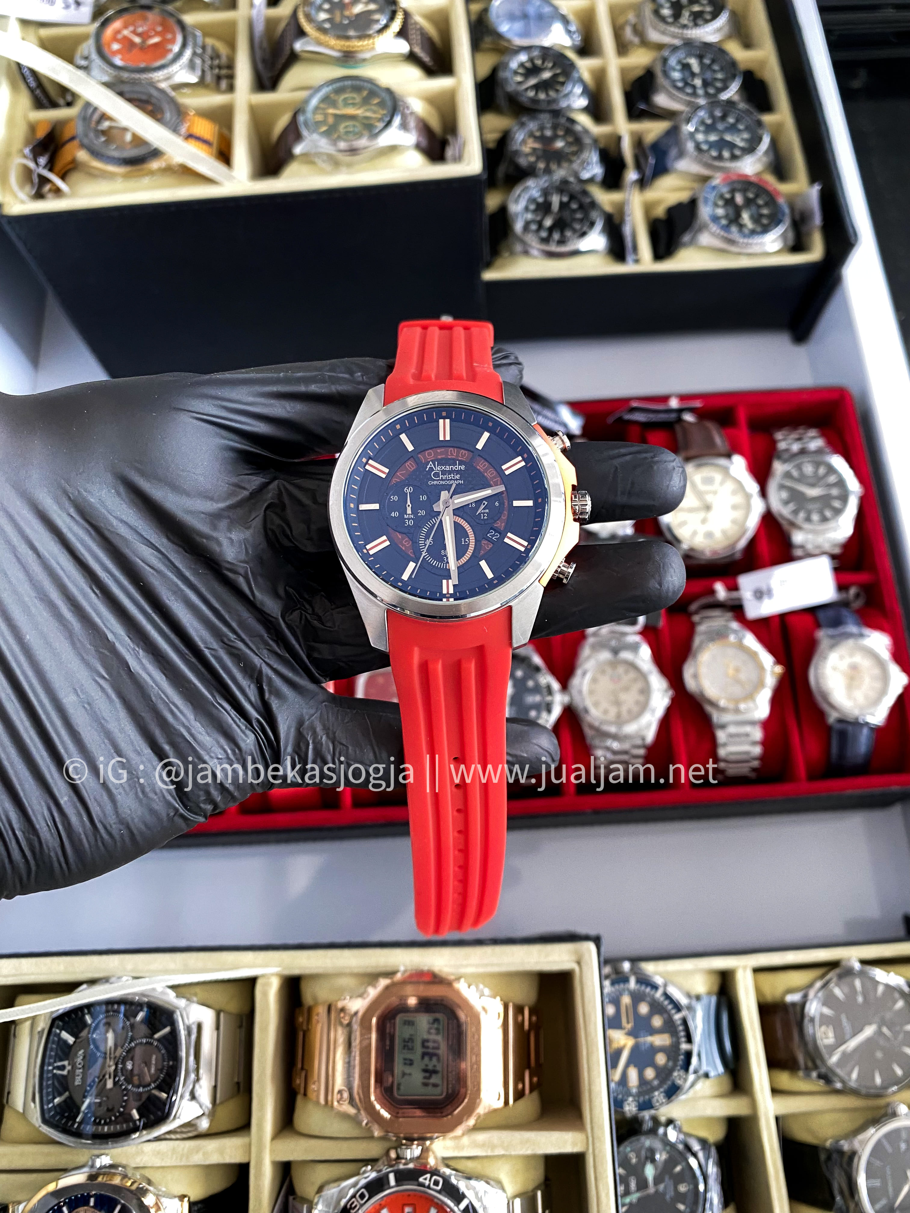(SKU 88) Alexandre christie 6325MC original Red rubber Strap Black Dial