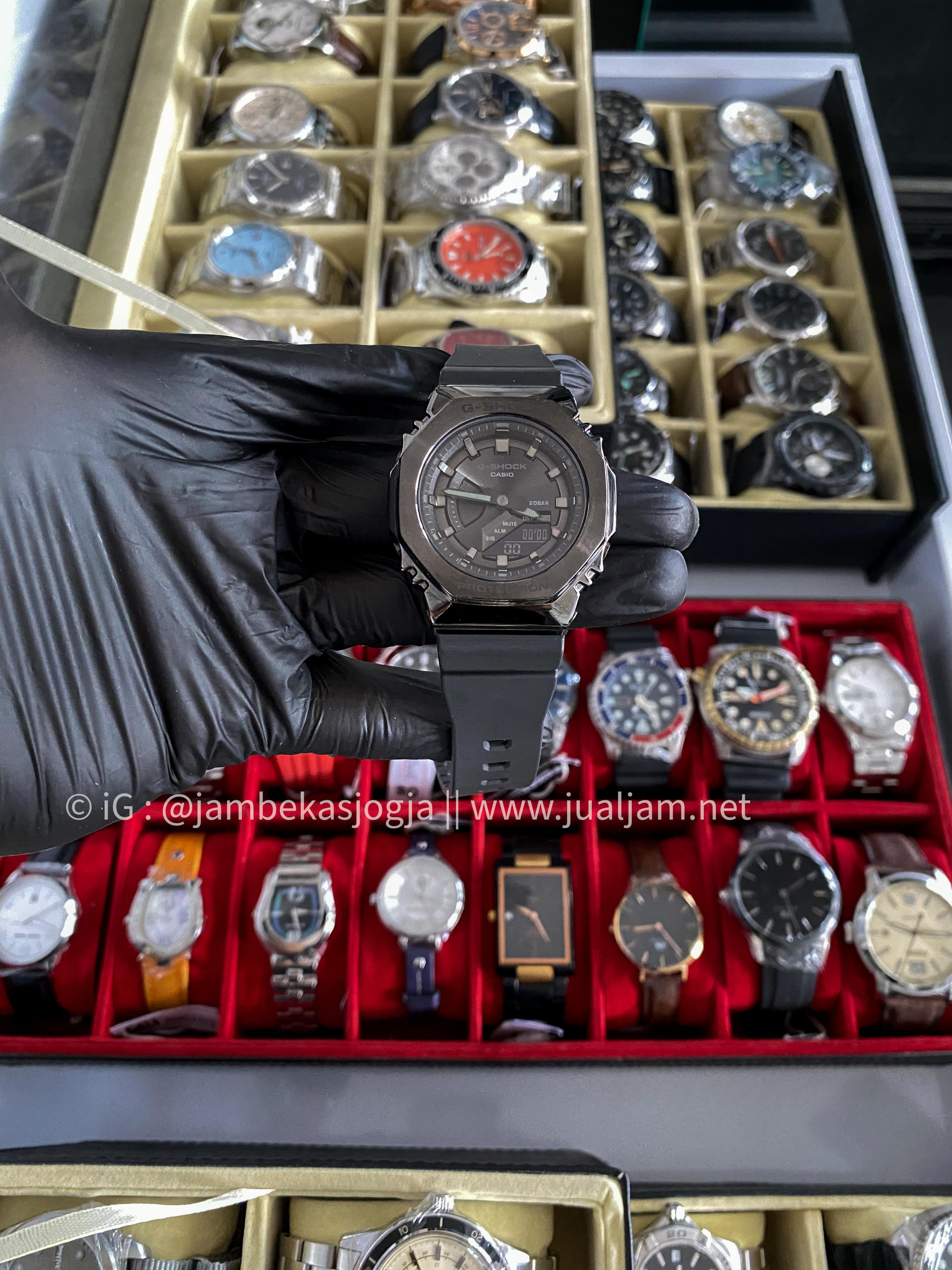 (SKU 67) Casio G-Shock X ITZY Metal Covered GM-S2100B-8ADR CasiOak Digital Analog Dial Dark Grey Resin Band