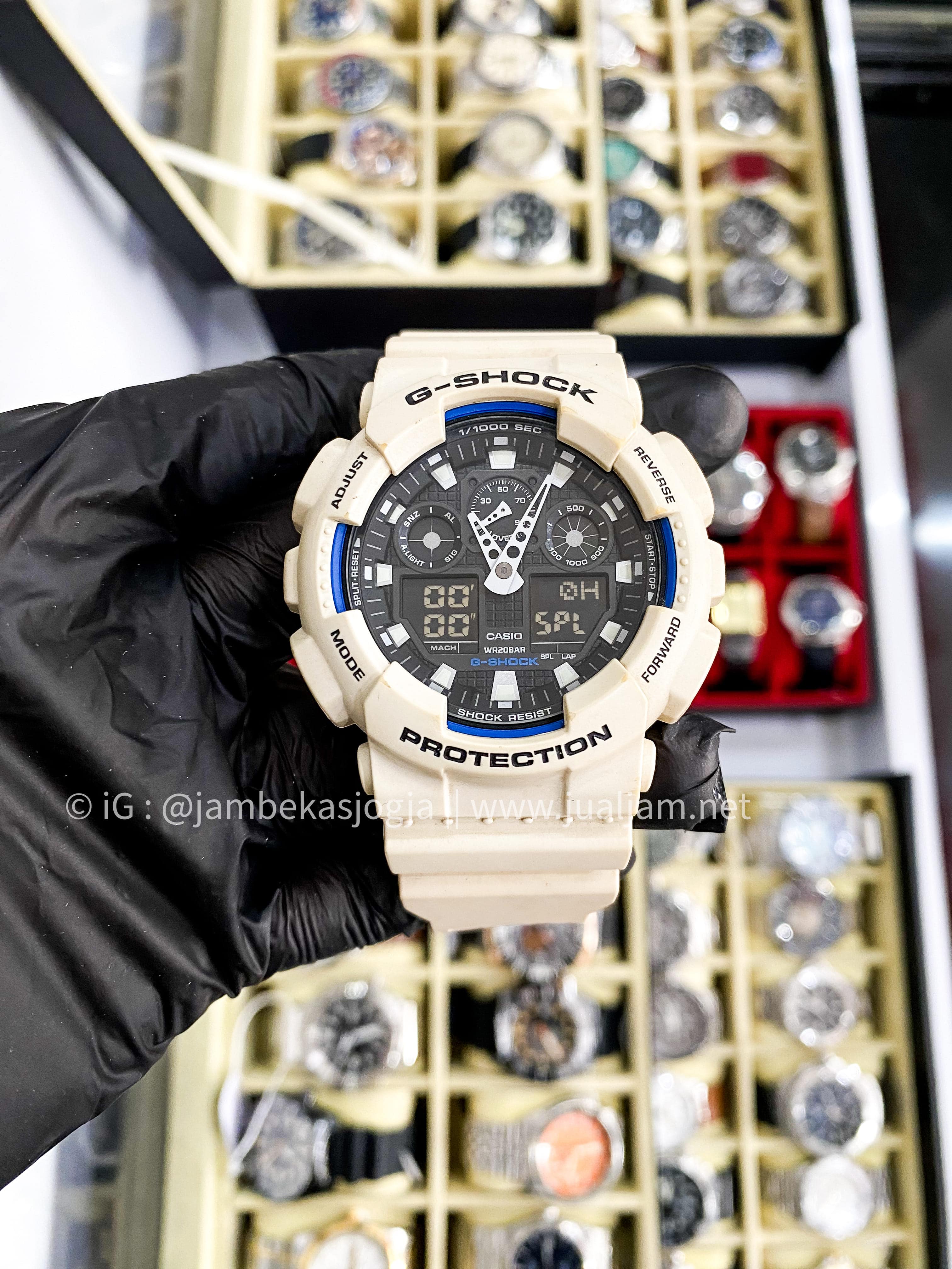 (SKU 247) Casio G-Shock GA-100B-7ADR Standard Black Digital Analog Dial White Resin Band